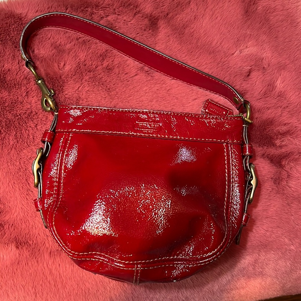 Coach small red leather  never used